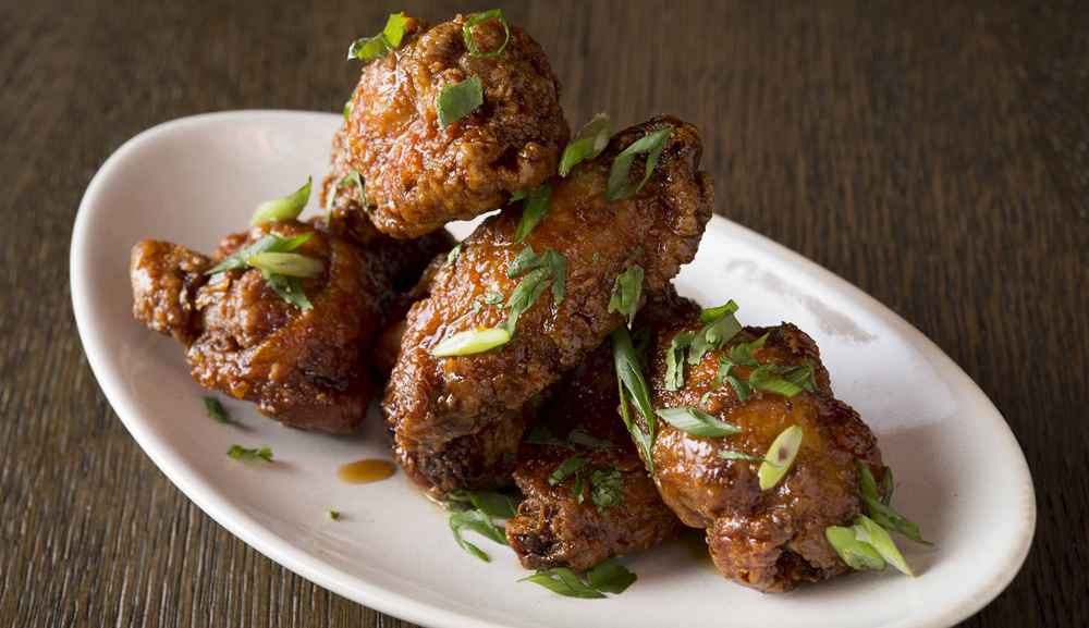 Bread Street Kitchen - Tamarind spiced chicken wings, spring onions, coriander